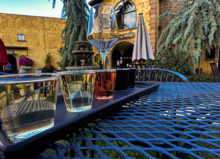 Outdoor wine tasting setup with glasses