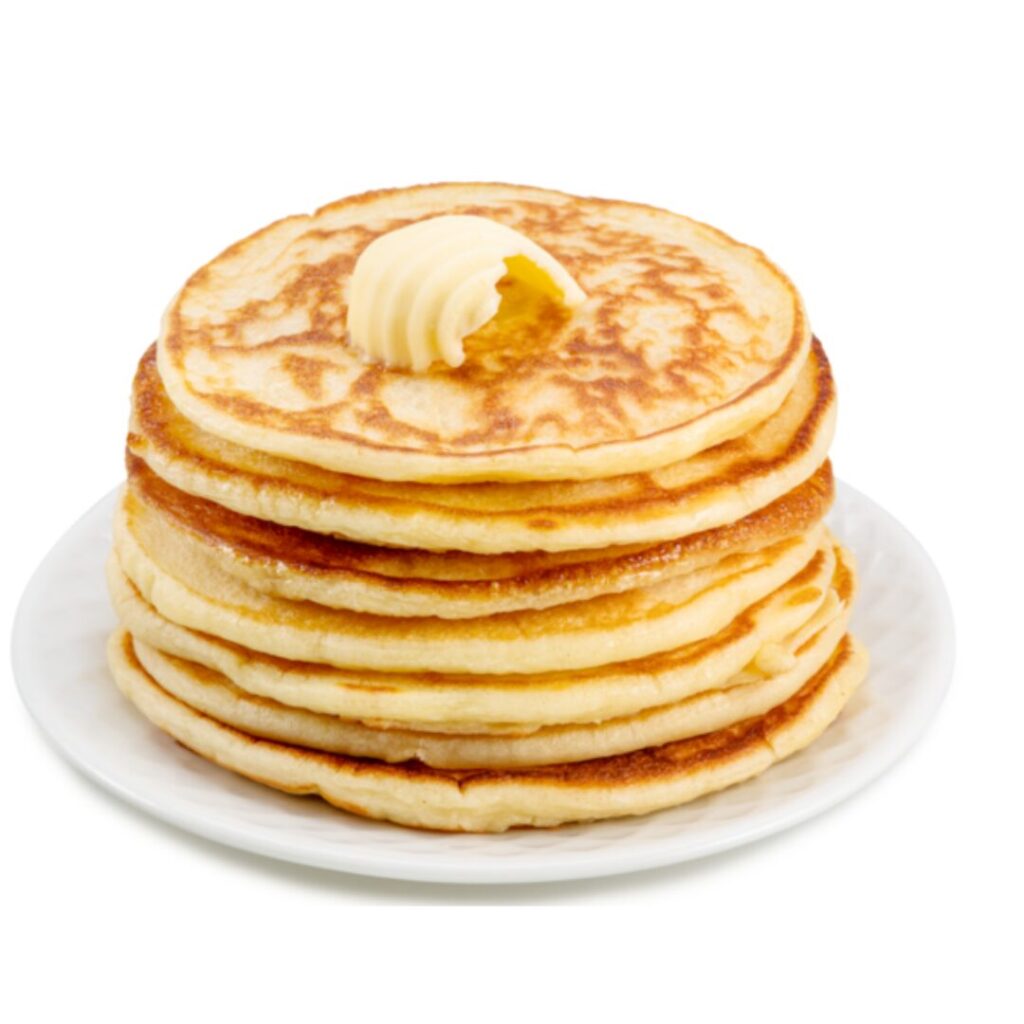 Stack of pancakes with butter on white plate.