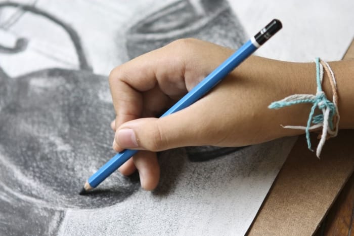 appointmentType-thumb-81382536 Hand drawing with blue pencil on paper.