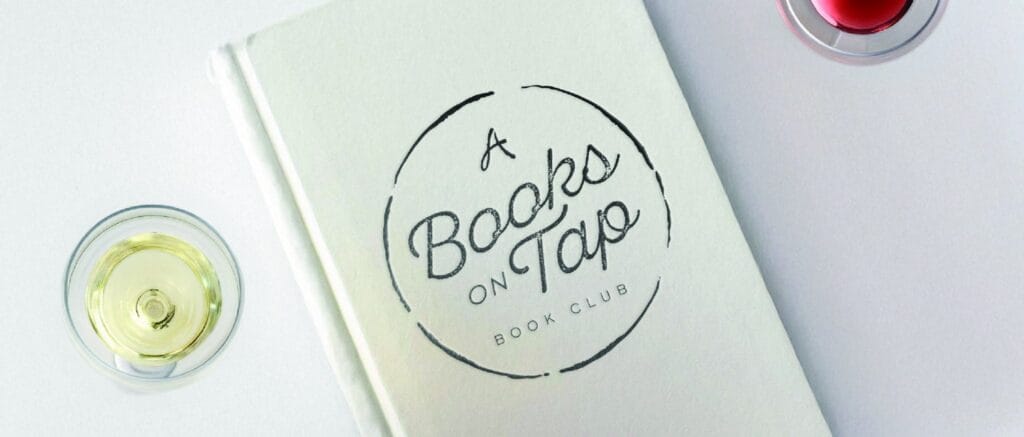 Books-on-Tap-Eblast-2048x874 Books on Tap Book Club logo on white notebook.