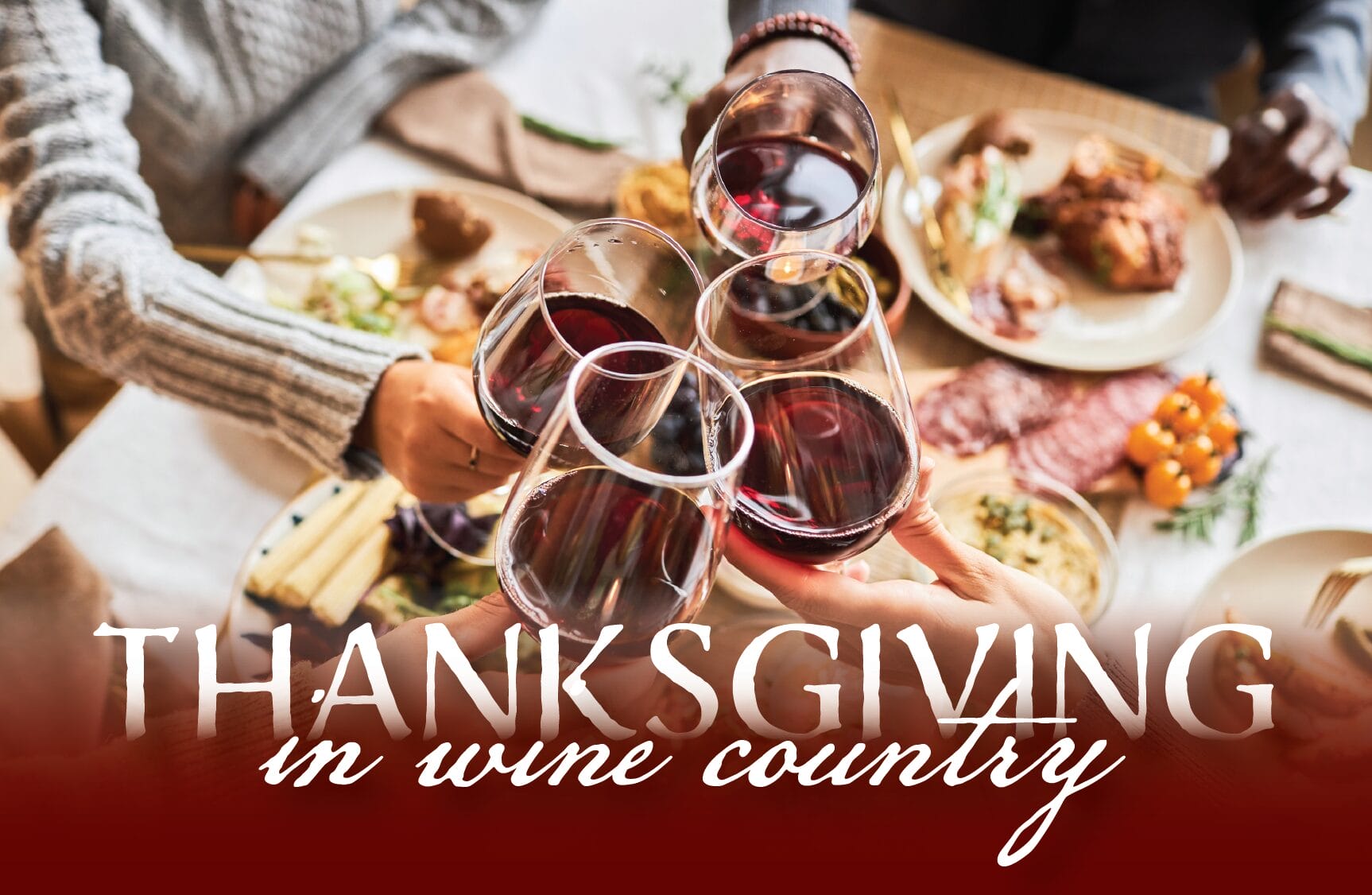 Thanksgiving table with wine glasses and food