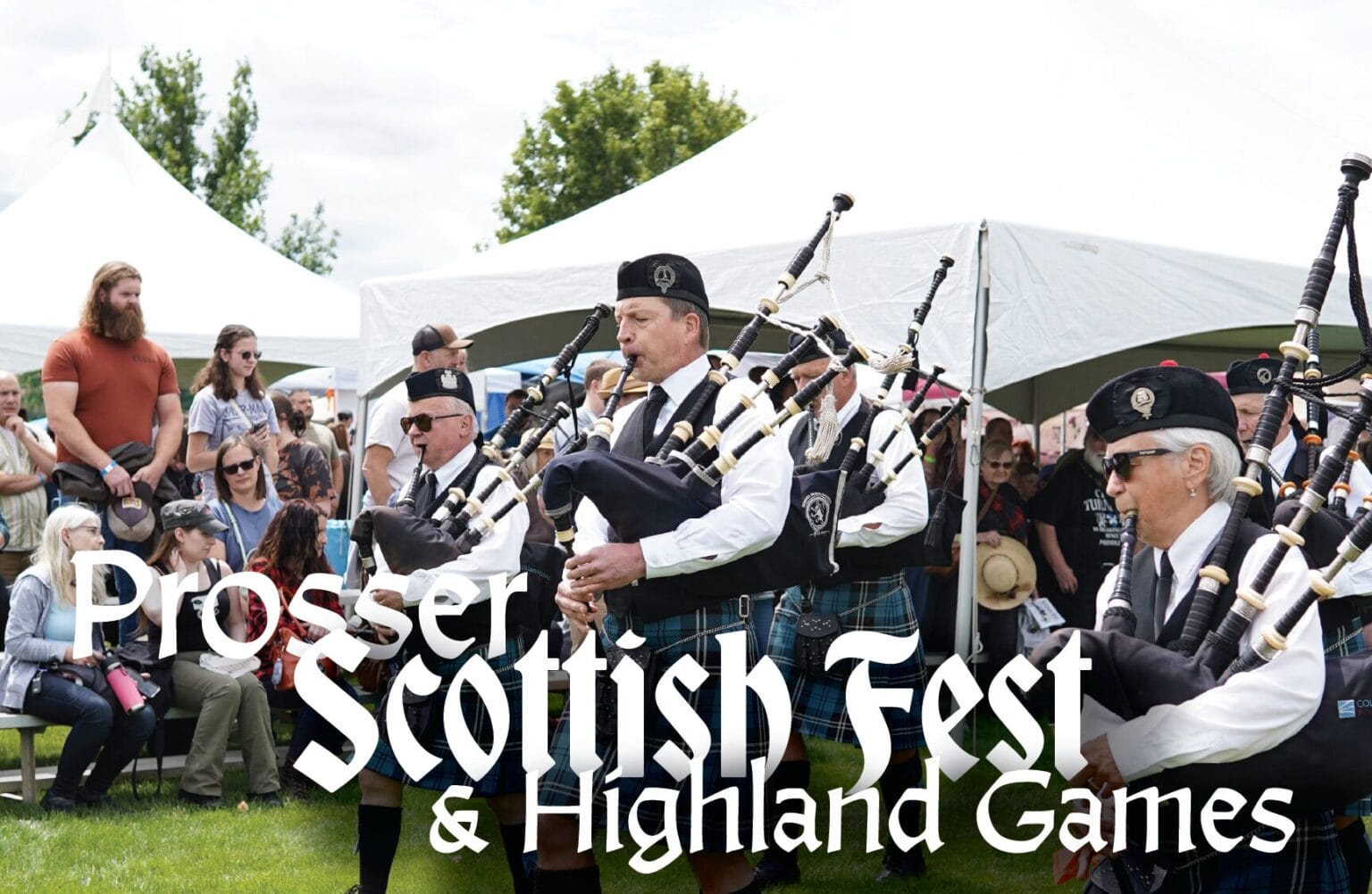 Bagpipers performing at Scottish festival event.