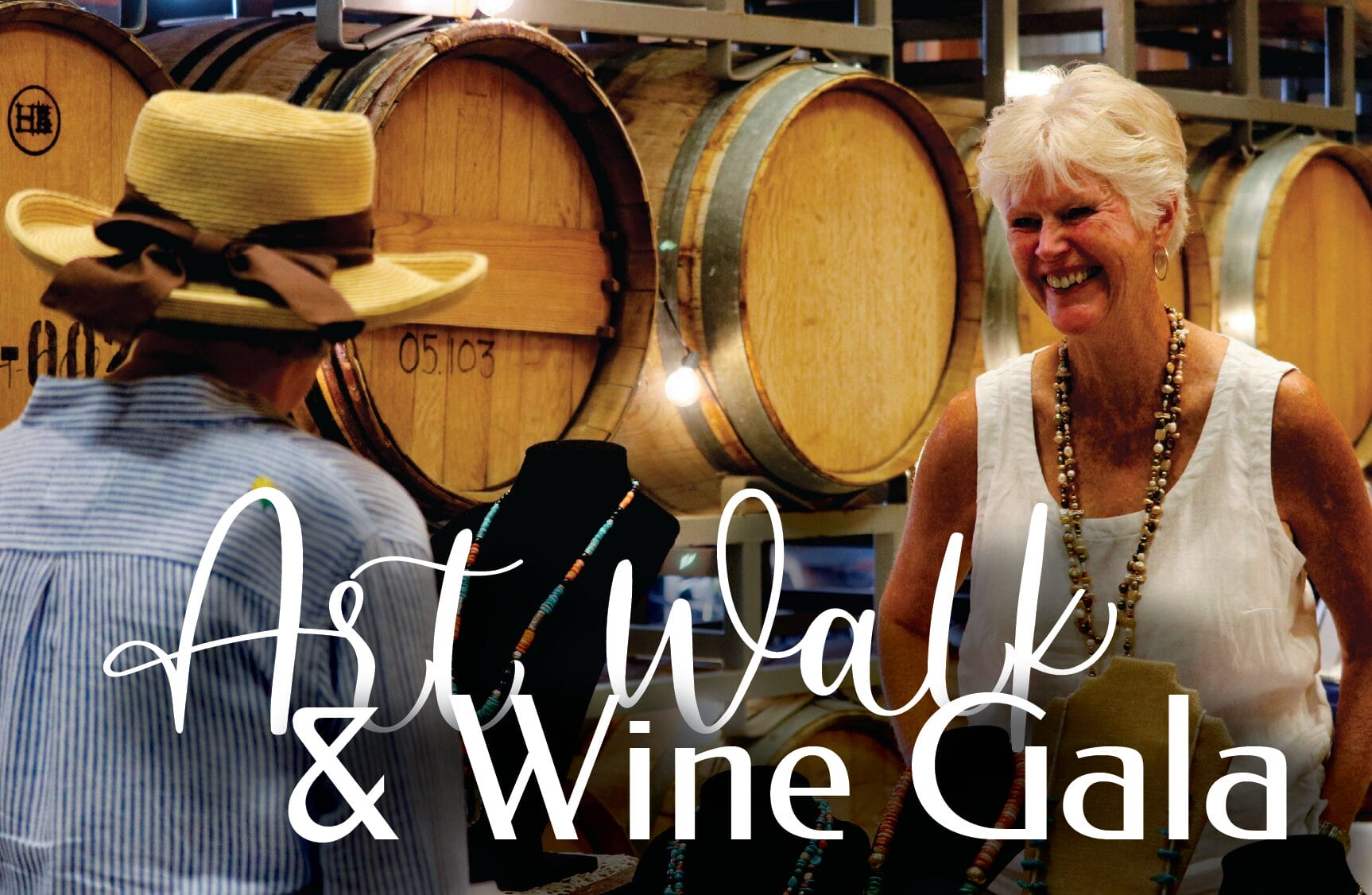 Smiling women at Art Walk and Wine Gala