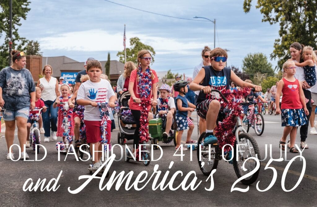Children celebrate Fourth of July parade.