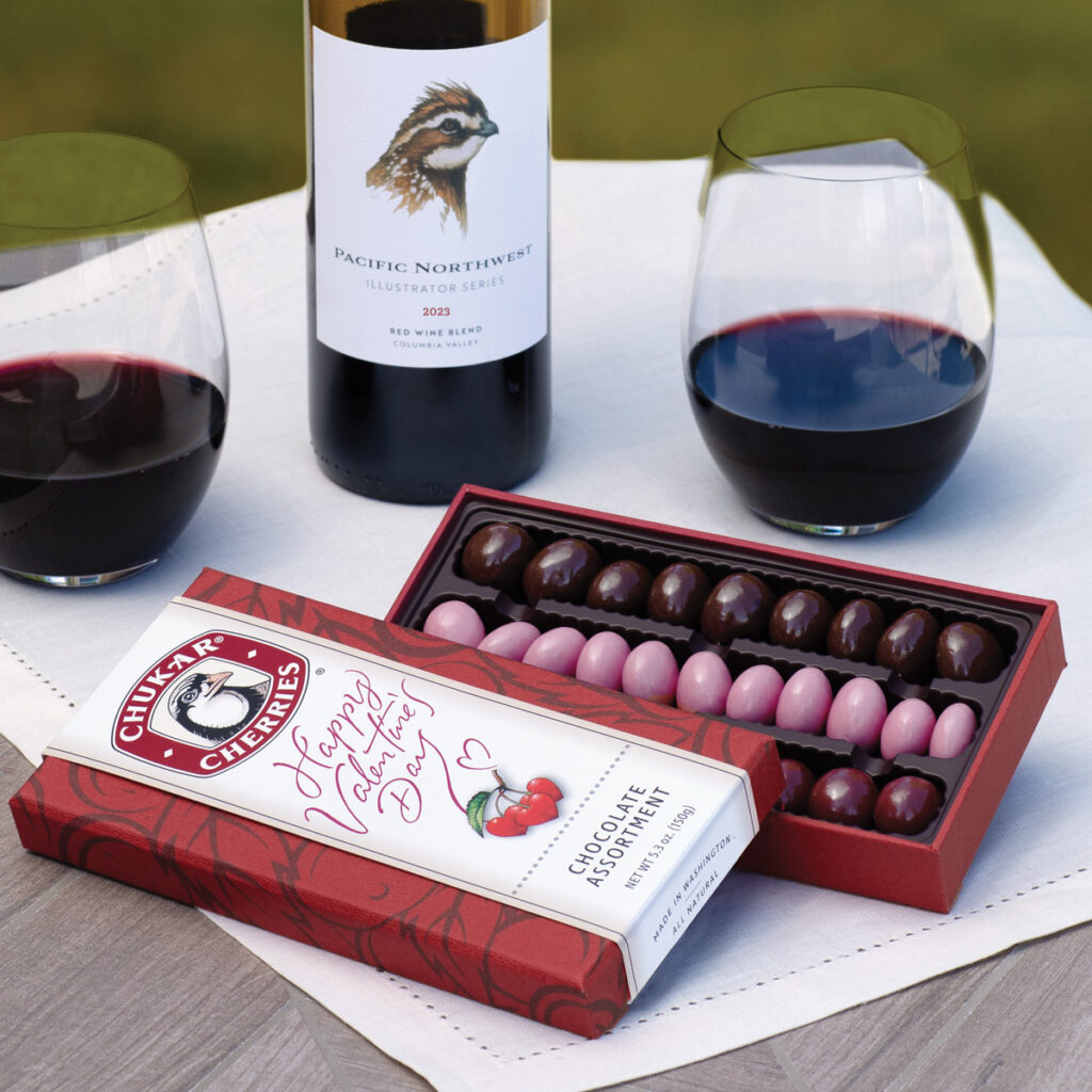 Wine and chocolates on a table.