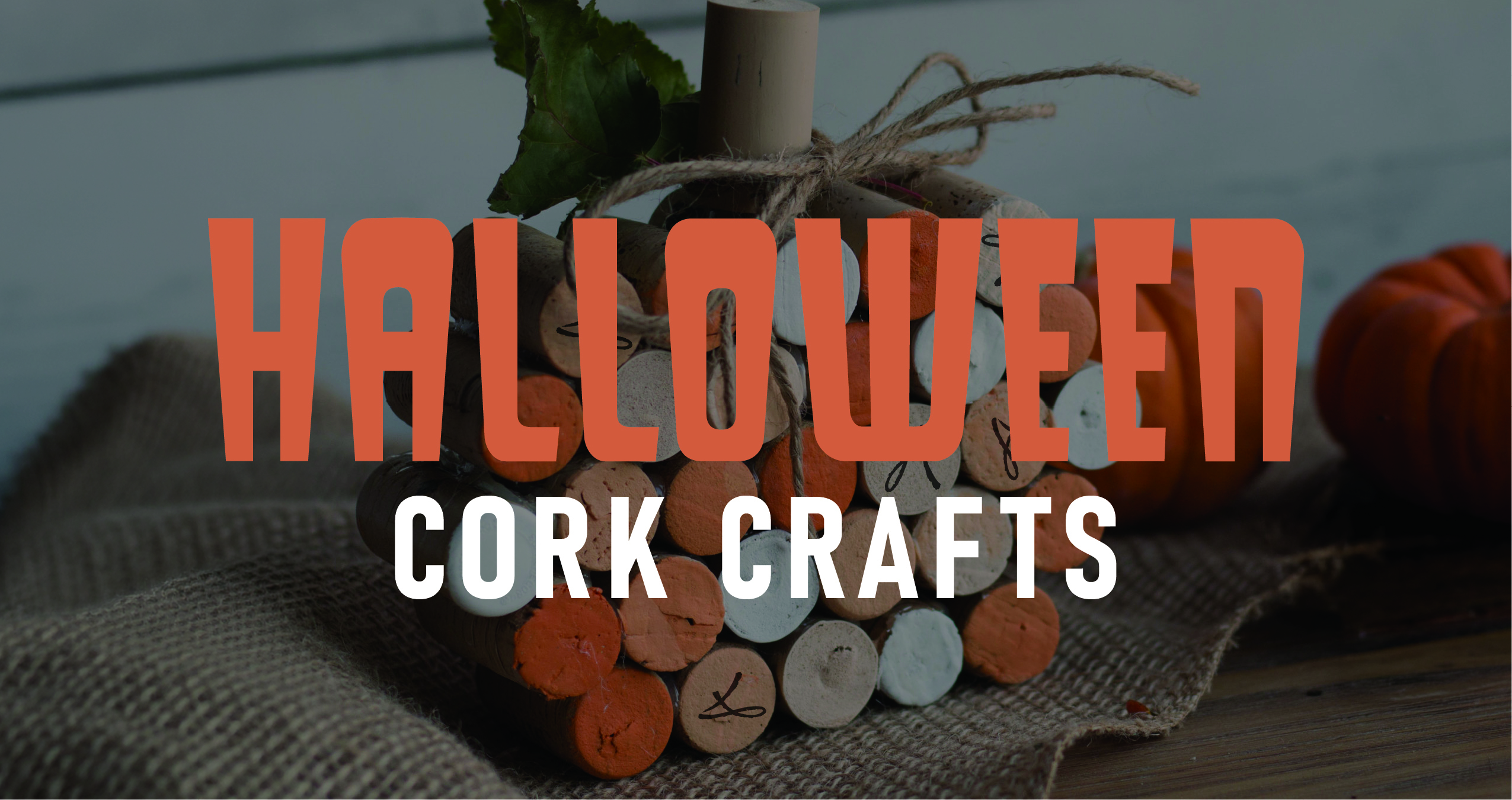 Halloween cork crafts centerpiece with painted corks and candle