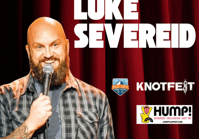 Stand-up comedy with microphone on stage curtain background.