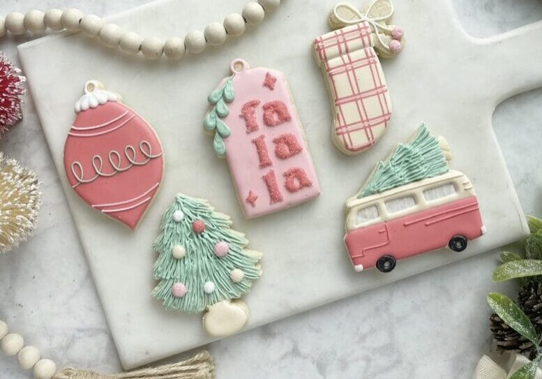 Decorative Christmas cookies on marble board.