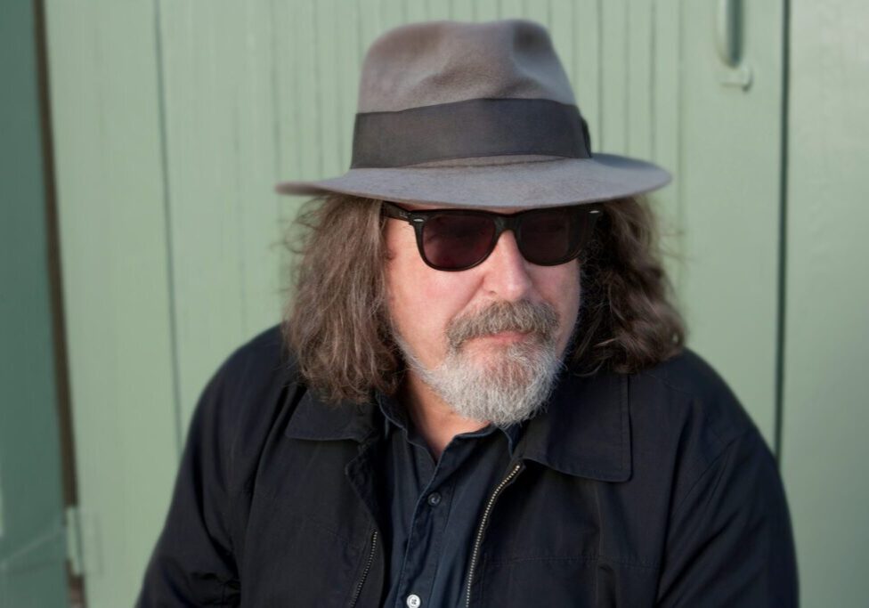 Man with hat and sunglasses portrait