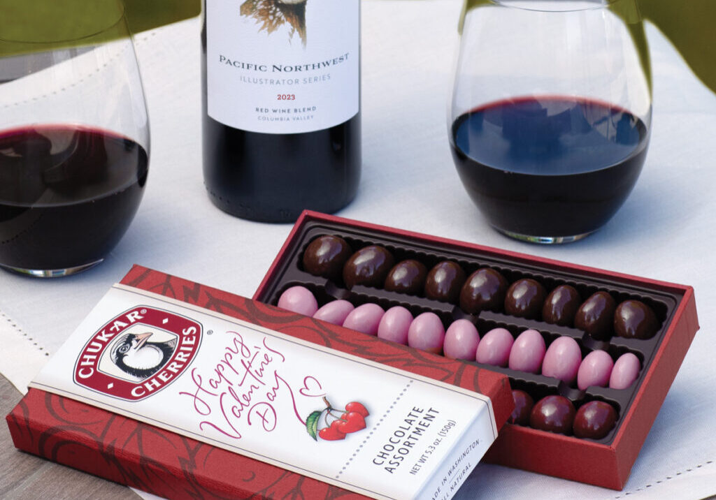 Wine and chocolates on a table.