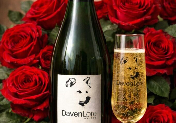 DavenLore Blanc de Blanc with red roses background.